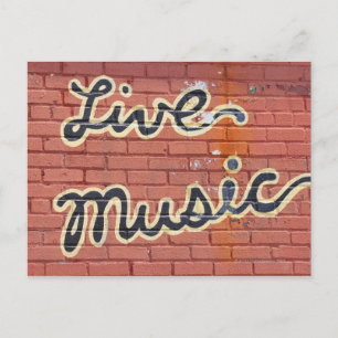 Postal Live music written on a wall