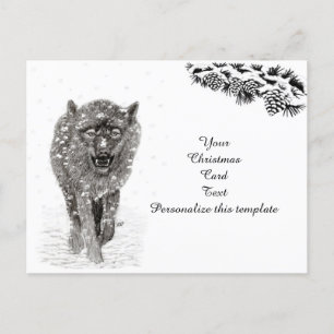 Postal Lobo negro enojado en la nieve, invierno salvaje
