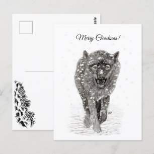 Postal Lobo negro enojado en la nieve, invierno salvaje