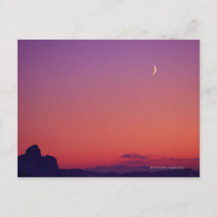Postal Luna creciente al anochecer