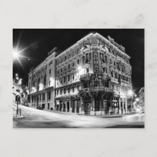 Postal Luz de la ciudad y edificios nocturnos