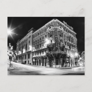 Postal Luz de la ciudad y edificios nocturnos