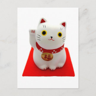 Postal Maneki blanco Neko en una alfombra roja