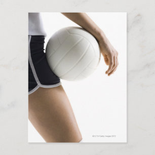 Postal mujer jugando al voleibol