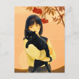 Postal Mujer sosteniendo un gato negro en otoño