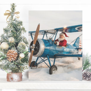 Postal Navidades Santa Blue Biplane Airplane y fotografía