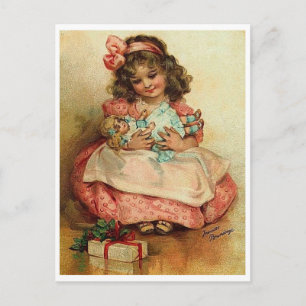 Postal Niña con su muñeca y regalo de Navidad