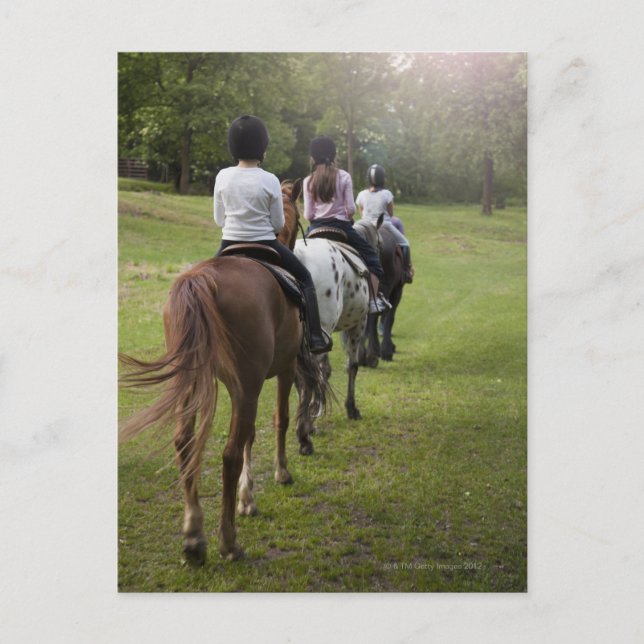 Postal Niñas pequeñas montando caballos (Anverso)
