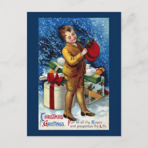 Postal Niño con la piña de regalo en la nieve