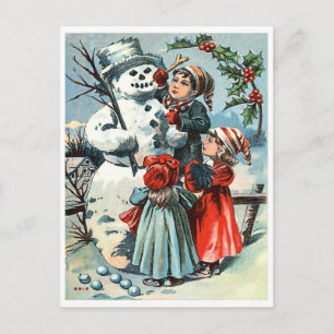 Postal Niño y dos niñas haciendo muñeco de nieve, vacacio