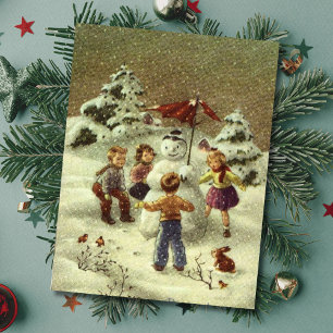 Postal Niños de la época haciendo snowman