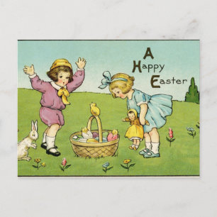 Postal Niños del vintage con conejitos y una cesta Pascua