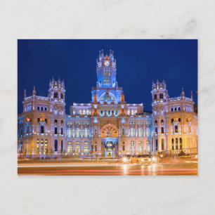 Postal Palacio de Comunicaciones de noche en Madrid