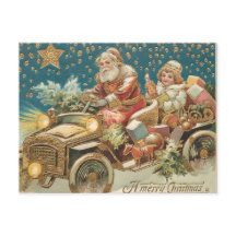 Papá Noel conduciendo un coche antiguo en la noche
