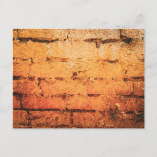 Postal Pared de ladrillo naranja desgastada