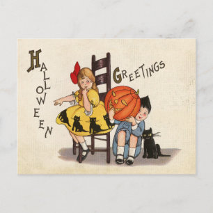 Postal Pareja de niños con calabaza tallada, Halloween