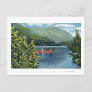 Postal Pareja en canoa en un lago