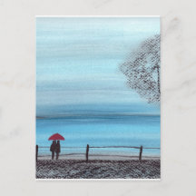 Pareja enamorada de paraguas rojos