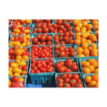 Pequeños tomates rojos y Naranjas