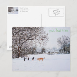 Postal perros jugando el paisaje de la nieve en los navid