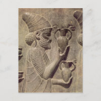 Phoenician carrying two offering, detail relief