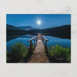 Postal Pier de noche bajo una luna llena