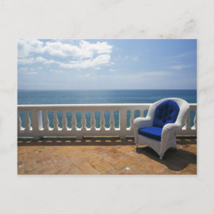 Postal Puerto Rico. Sillón de mimbre y terraza de baldosa