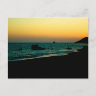 Postal puesta de sol en la playa