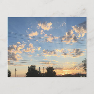 Postal Puesta de sol y nubes hermosas