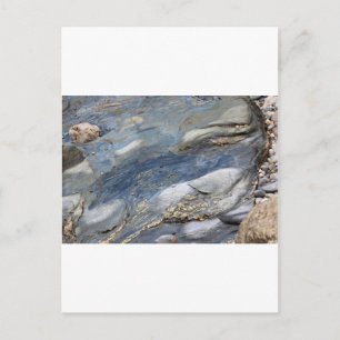 Postal Rocas bañadas en el mar