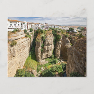 Postal Ronda. Cañón. Ciudad. Gente.
