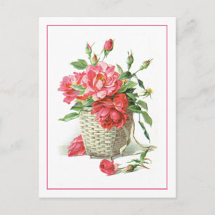 Postal Roses rojos en una canasta