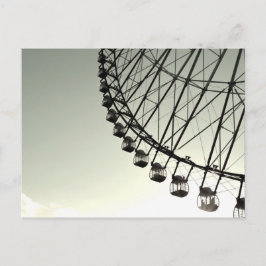 Postal Rueda de la fortuna al anochecer