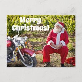 Postal Santa descansando con sus Navidades en motocicleta