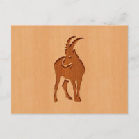 Silueta de Capricornio grabada en diseño de madera