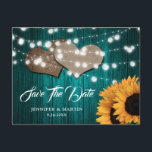 Postal Sunflower Teal Wood Wedding Save The Date<br><div class="desc">Teal and sunflower wedding save the date postcard featuring sunflowers,  string lights and burlap hearts against a rustic wood background.</div>