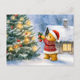 Postal Teddy Bear Decorating a Christmas Tree in snowing 