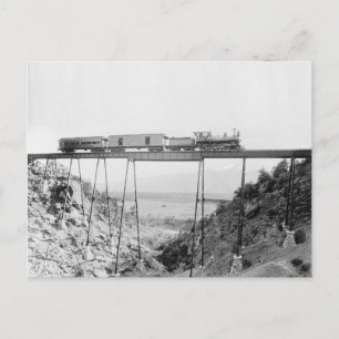 Postal Tren cruzando un puente alto, 1890