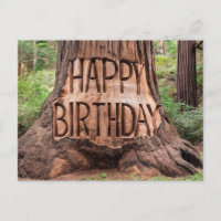 tronco de árbol tallado con feliz cumpleaños