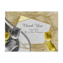 Tulipanes grises y amarillos sobre la textura