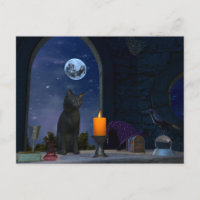 Un gato negro lindo mirando una vela