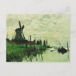 Postal Un Molino En Zandam 2 - Claude Monet - 1871<br><div class="desc">Muestre a la gente su estilo y refinamiento con esta reproducción de una fina obra de arte titulada "Un molino en Zandam" de Claude Monet. Paisaje de un molino de viento de estilo holandés al lado de un río. Pintado alrededor de 1871.</div>