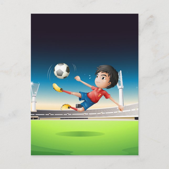 Postal Un niño con uniforme rojo en el campo de fútbol (Anverso)