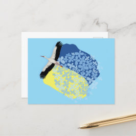 Postal Una cigüeña lleva una bandera ucraniana