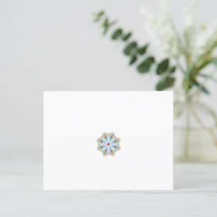 Postal una flor azul y marrón con un centro rojo