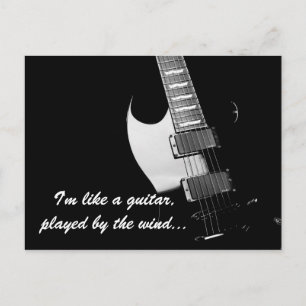 Postal Una guitarra negra
