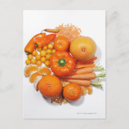 Postal Una selección de frutas y verduras naranjas.