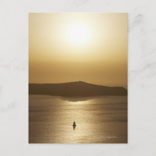 Postal Vela al atardecer