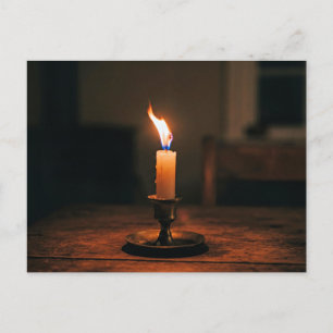 Postal Vela única ardiendo intensamente