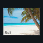 Postal Viaje de palmeras tropicales de Bali Indonesia<br><div class="desc">¡A cualquiera le encantaría recibir esta postal de viaje con una foto del océano y una palmera en una playa tropical de Bali,  Indonesia!</div>